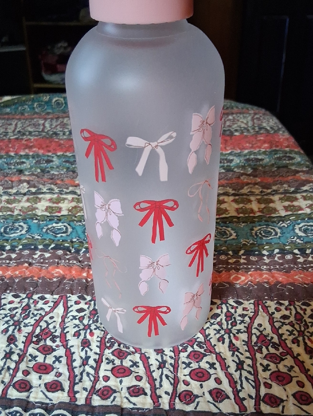 Frosted Glass Water Bottle with Pink and Red Bow Design